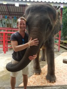 Justin Deckert with an elephant