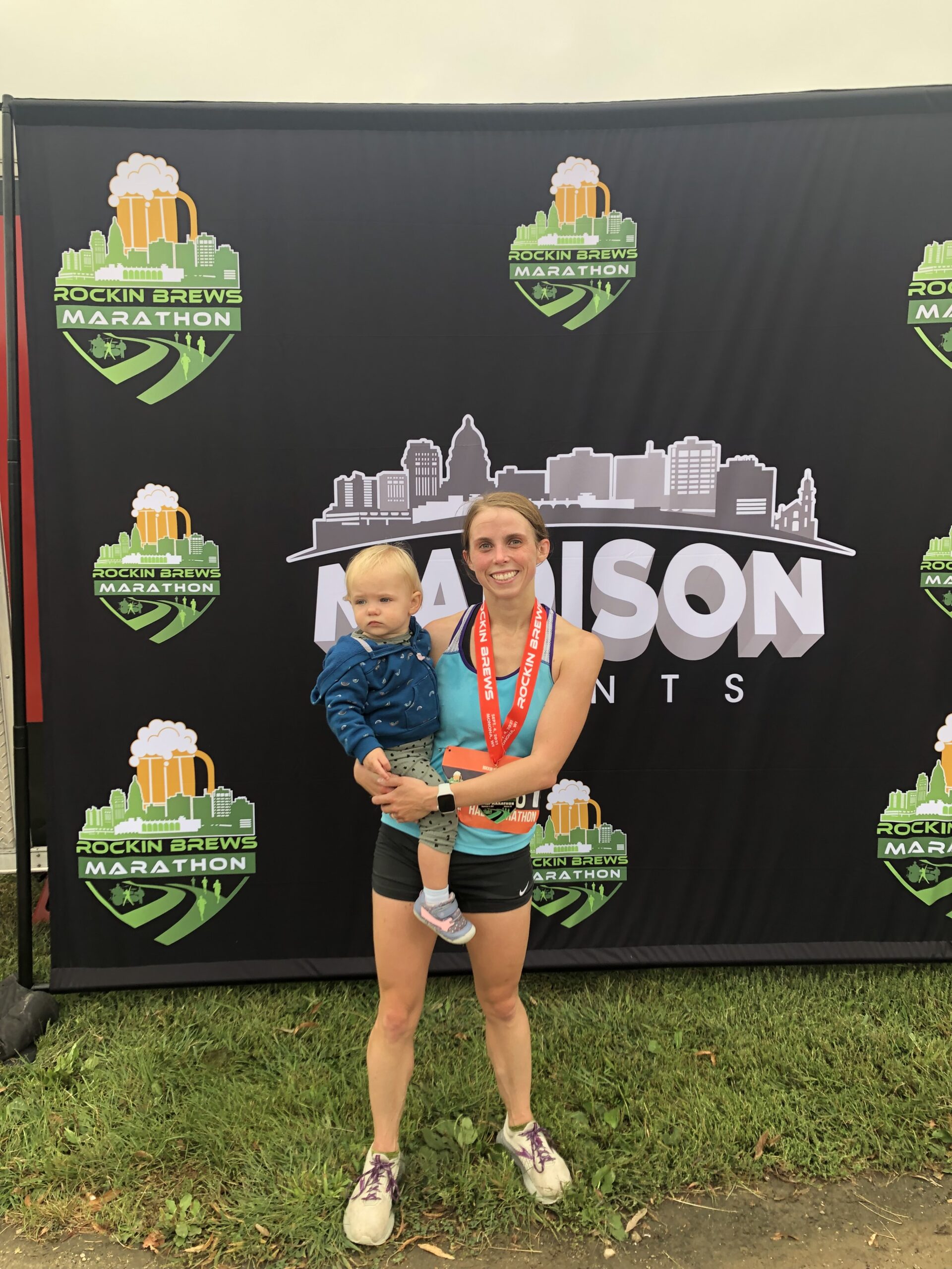 2 women on beach smiling for picture