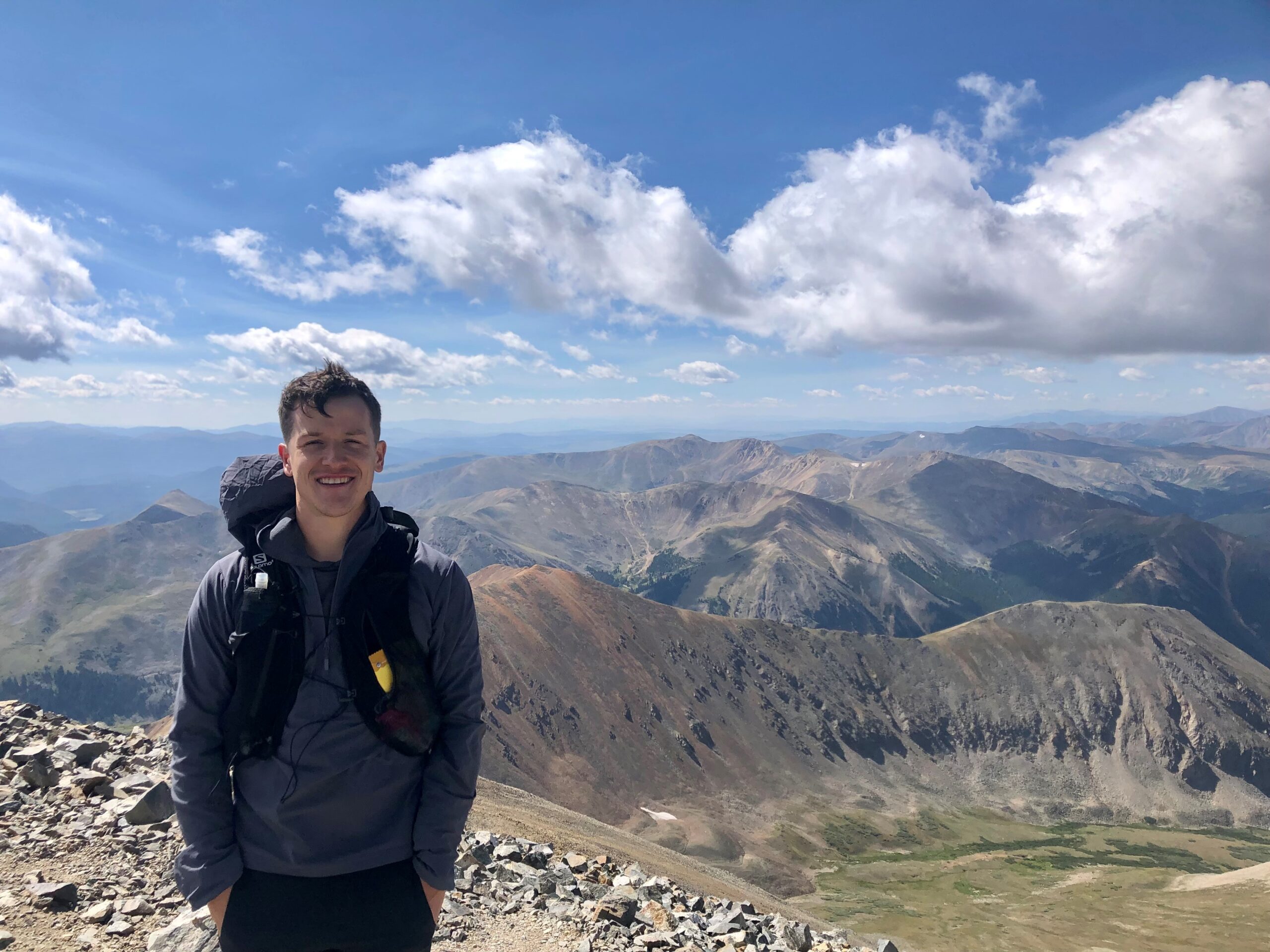 man climbing mountain