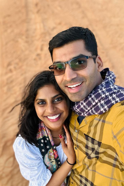 Image shows Ayush and his wife.