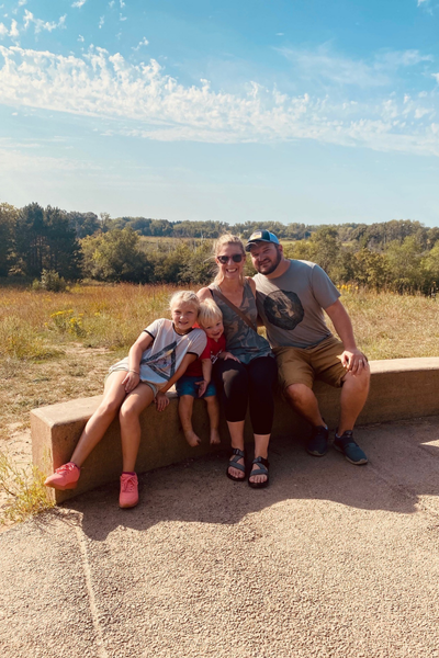 Image shows Catherine and her family.