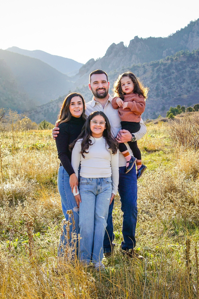 Image shows Daniela and her family.