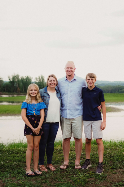 Image shows Jill and her family.