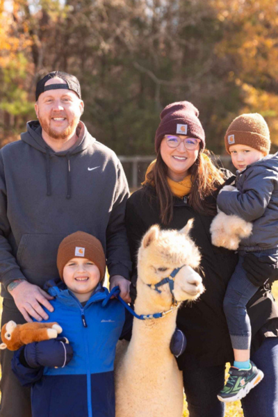 Image shows Marc Price and his family.