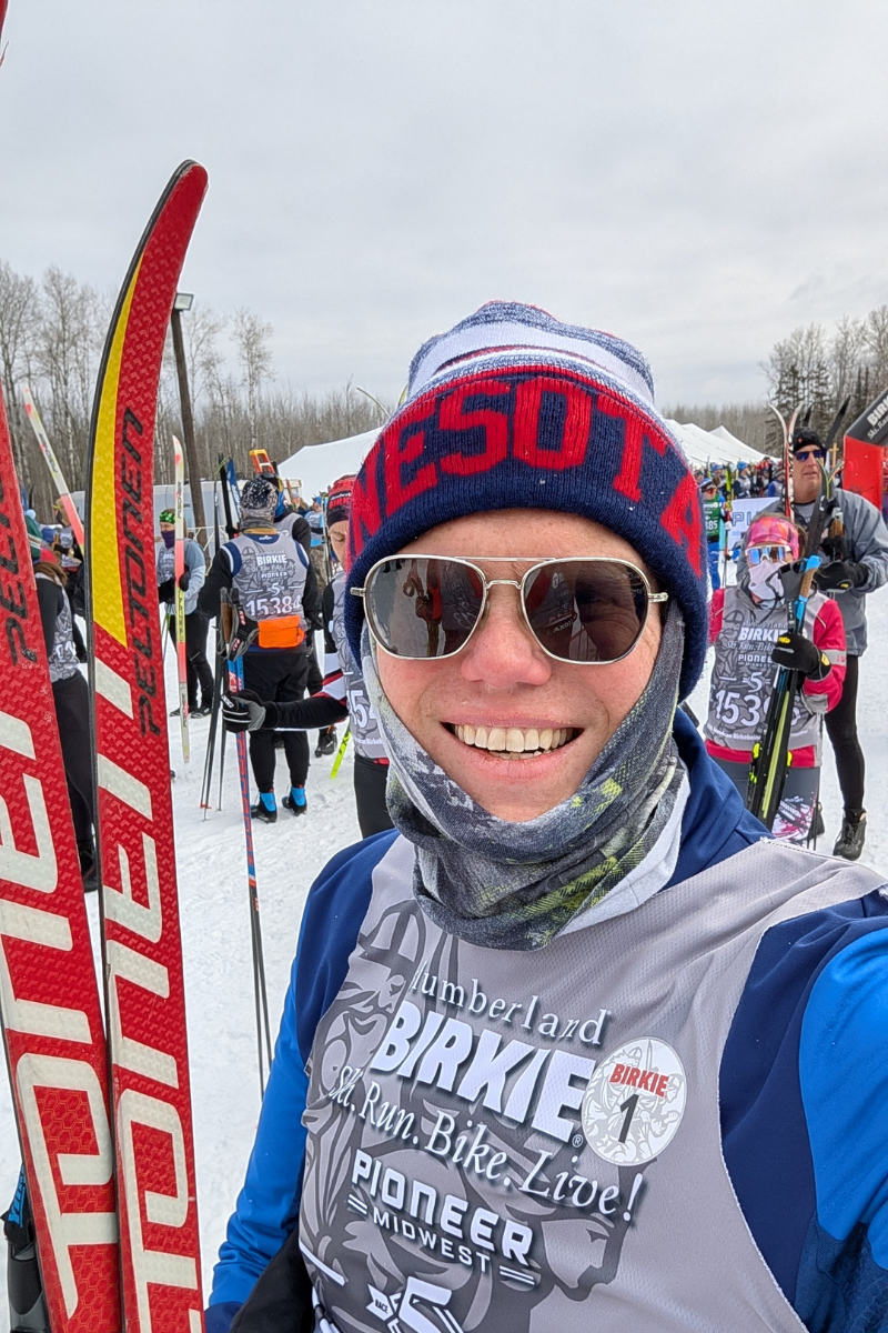 Image shows Carl skiing.