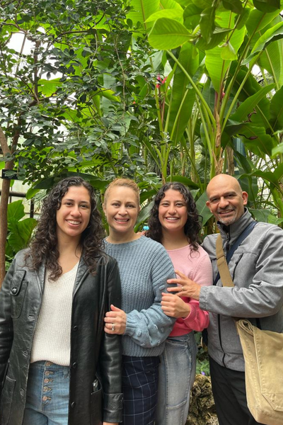 Image shows Kamila and her family.