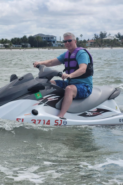 Image shows Steve on a jetski.